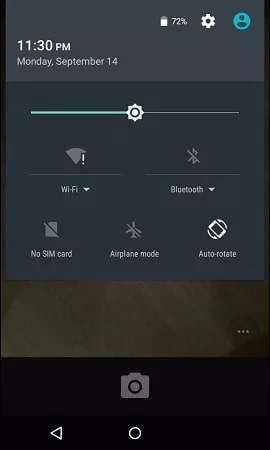 The notification panel on LG devices when the device is locked showcasing the Settings option